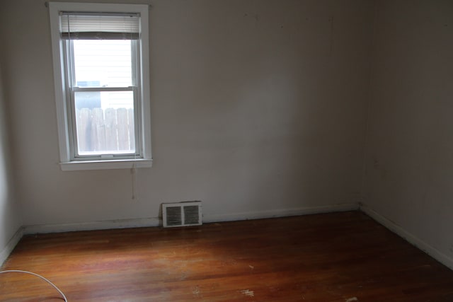 1093 Ford Blvd, Lincoln Park, MI 48146 - unfurnished room with baseboards and wood finished floors