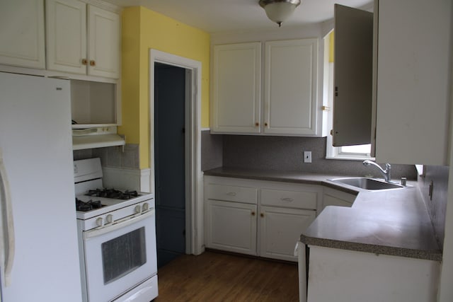 1093 Ford Blvd, Lincoln Park, MI 48146 - kitchen featuring white appliances, under cabinet range hood, a sink, dark wood-style flooring, and white cabinetry