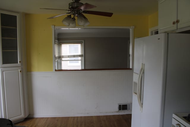 1093 Ford Blvd, Lincoln Park, MI 48146 - kitchen featuring white refrigerator with ice dispenser, wainscoting, ceiling fan, and wood finished floors
