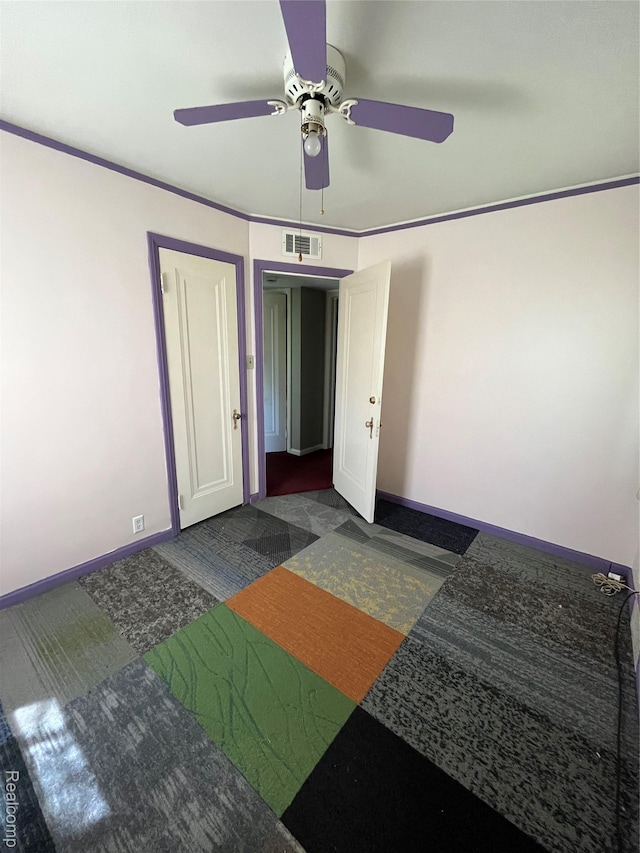 20711 Gaukler St, Saint Clair Shores, MI 48080 - bedroom featuring crown molding, a ceiling fan, and dark colored carpet