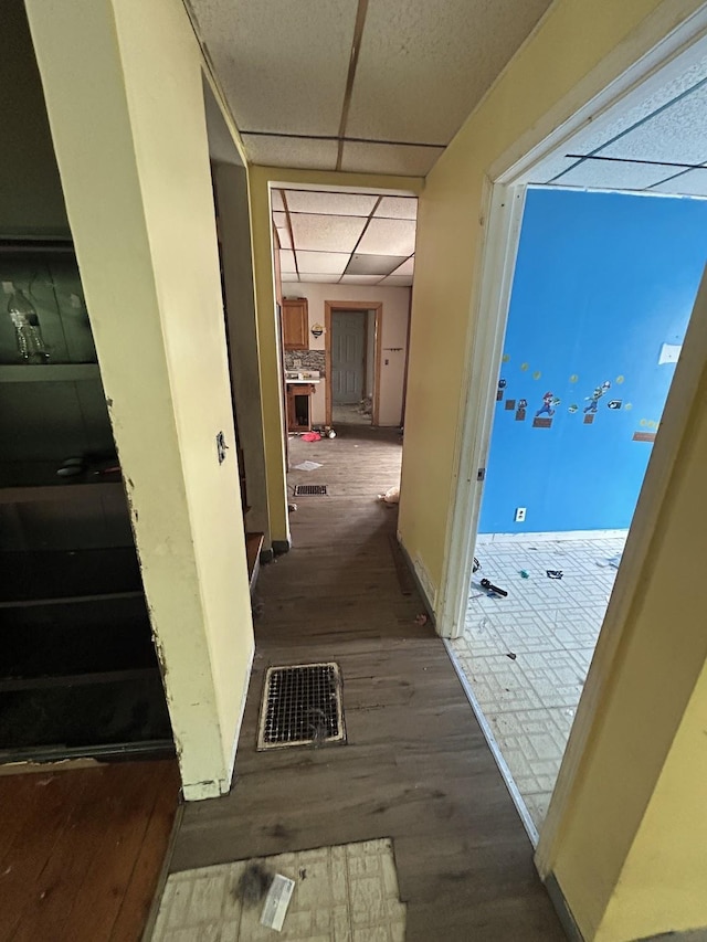 715 Avon St, Flint, MI 48503 - hall featuring a paneled ceiling and wood finished floors