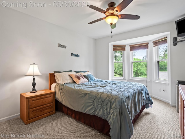 6102 Cherry Ridge Dr, Howell, MI 48855 - bedroom featuring baseboards, light carpet, and ceiling fan