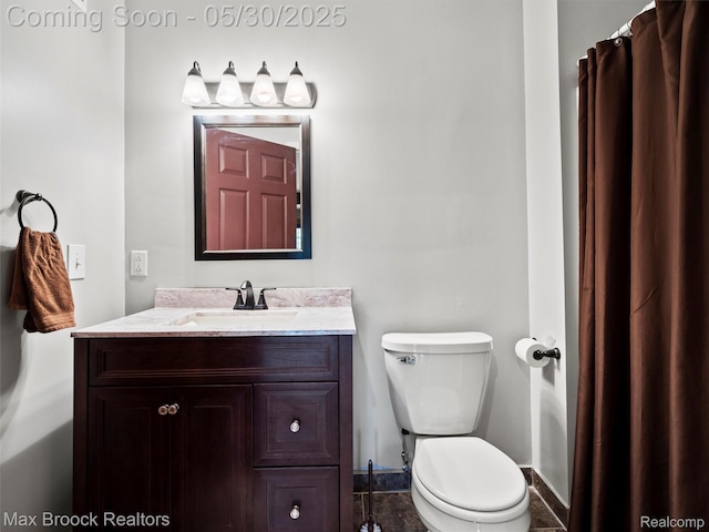 6102 Cherry Ridge Dr, Howell, MI 48855 - full bathroom featuring vanity, toilet, and baseboards
