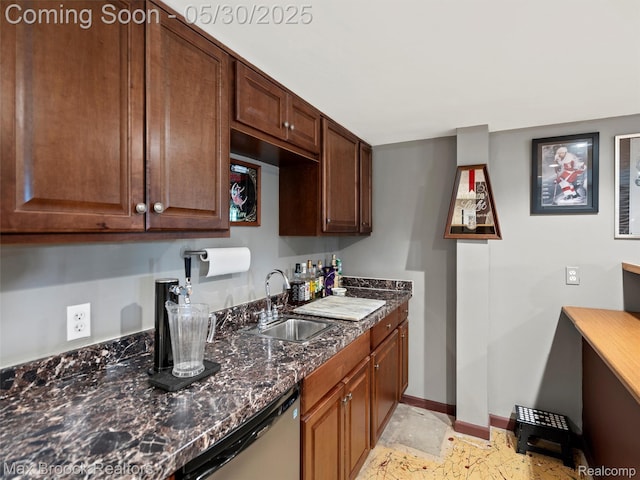 6102 Cherry Ridge Dr, Howell, MI 48855 - kitchen with a sink, stainless steel dishwasher, baseboards, and dark stone counters
