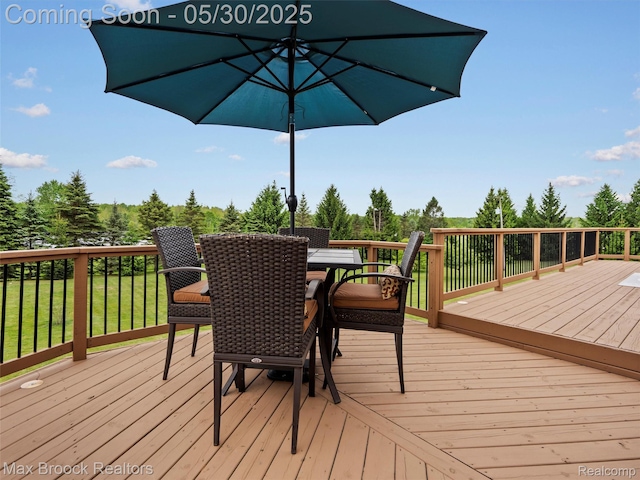 6102 Cherry Ridge Dr, Howell, MI 48855 - wooden terrace with outdoor dining area