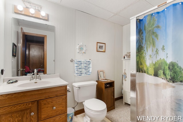 937 Village Ct, Holland, MI 49423 - bathroom featuring vanity, toilet, and a paneled ceiling