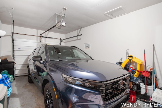 937 Village Ct, Holland, MI 49423 - garage with a garage door opener