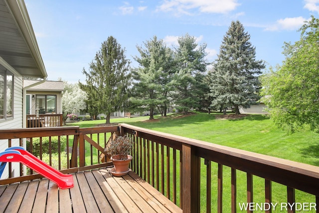 937 Village Ct, Holland, MI 49423 - wooden terrace featuring a lawn