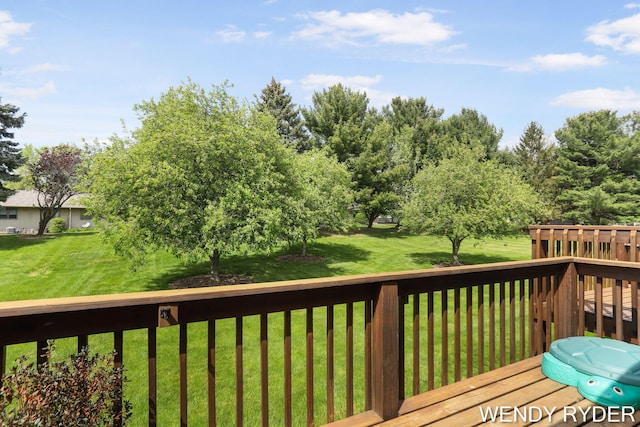 937 Village Ct, Holland, MI 49423 - wooden terrace featuring a lawn