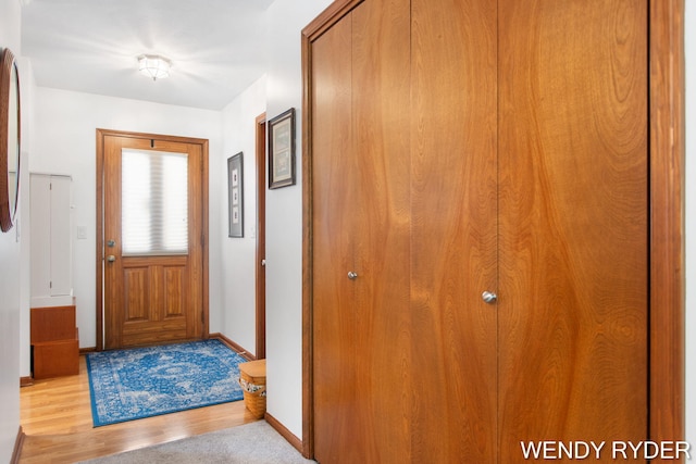 937 Village Ct, Holland, MI 49423 - foyer entrance with wood finished floors and baseboards