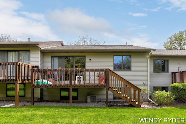 937 Village Ct, Holland, MI 49423 - rear view of house featuring a deck, central AC unit, a yard, and stairs