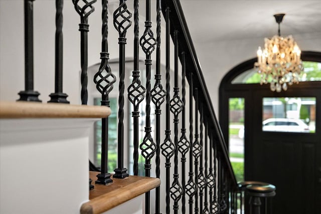 820 Hazel St, Birmingham, MI 48009 - stairway with a chandelier