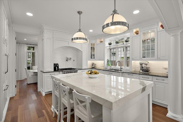820 Hazel St, Birmingham, MI 48009 - kitchen with white cabinets, a sink, dark wood-style flooring, decorative backsplash, and recessed lighting