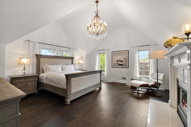 820 Hazel St, Birmingham, MI 48009 - bedroom featuring multiple windows, a chandelier, a fireplace with flush hearth, wood finished floors, and high vaulted ceiling