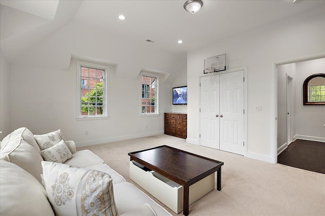 820 Hazel St, Birmingham, MI 48009 - carpeted living room featuring lofted ceiling, healthy amount of natural light, baseboards, and recessed lighting