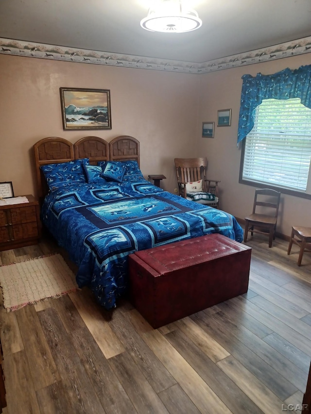1186 Buckingham Ct, Adrian, MI 49221 - bedroom with wood finished floors