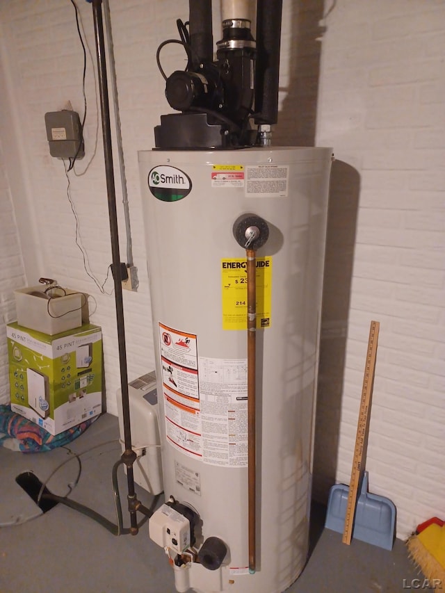 1186 Buckingham Ct, Adrian, MI 49221 - utility room featuring gas water heater