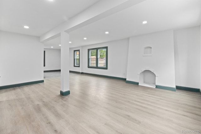 15781 Washburn St, Detroit, MI 48238 - unfurnished living room featuring recessed lighting, light wood-style floors, and baseboards