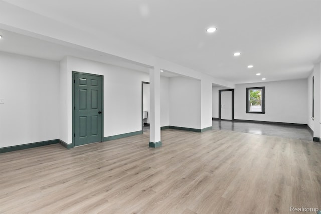 15781 Washburn St, Detroit, MI 48238 - unfurnished living room with recessed lighting, light wood-type flooring, and baseboards