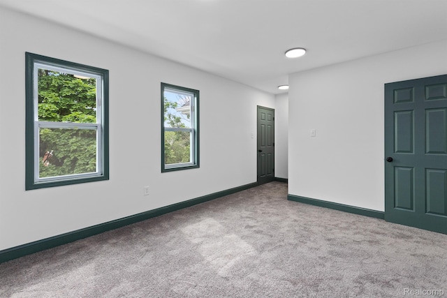 15781 Washburn St, Detroit, MI 48238 - carpeted empty room with baseboards