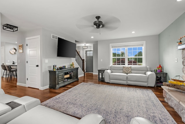 1600 Tuttle Rd, Mason, MI 48854 - living area featuring stairs, a ceiling fan, wood finished floors, recessed lighting, and baseboards