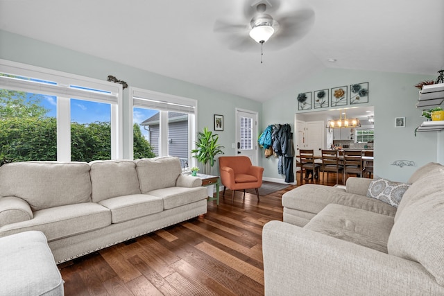 1600 Tuttle Rd, Mason, MI 48854 - living room with lofted ceiling, a ceiling fan, dark wood finished floors, a chandelier, and baseboards