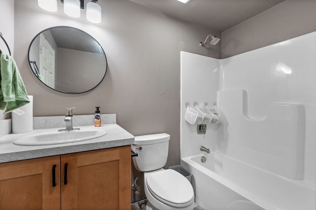 1600 Tuttle Rd, Mason, MI 48854 - full bath featuring toilet, vanity, and washtub / shower combination