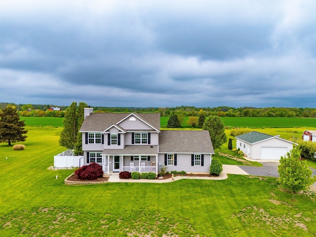 1600 Tuttle Rd, Mason, MI 48854 - traditional-style house featuring a porch, a garage, an outdoor structure, a chimney, and roof with shingles