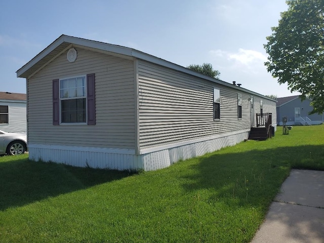 5232 E Broadway, Mount Pleasant, MI 48858 - view of property exterior with a yard