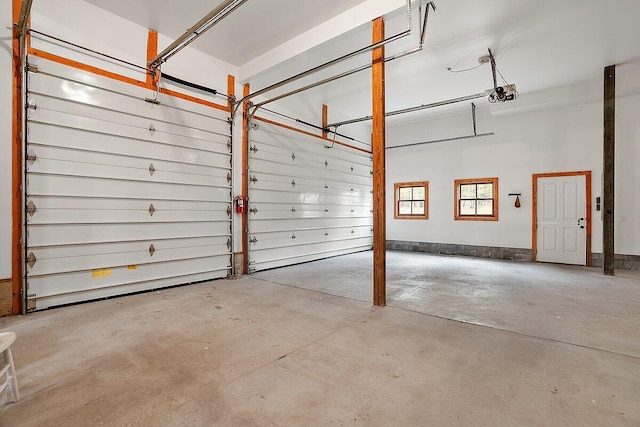 8282 W Harrison Rd, Mears, MI 49436 - garage with a garage door opener