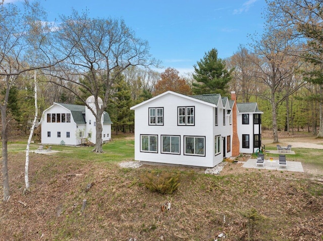 8282 W Harrison Rd, Mears, MI 49436 - view of home's exterior with a yard and view of scattered trees