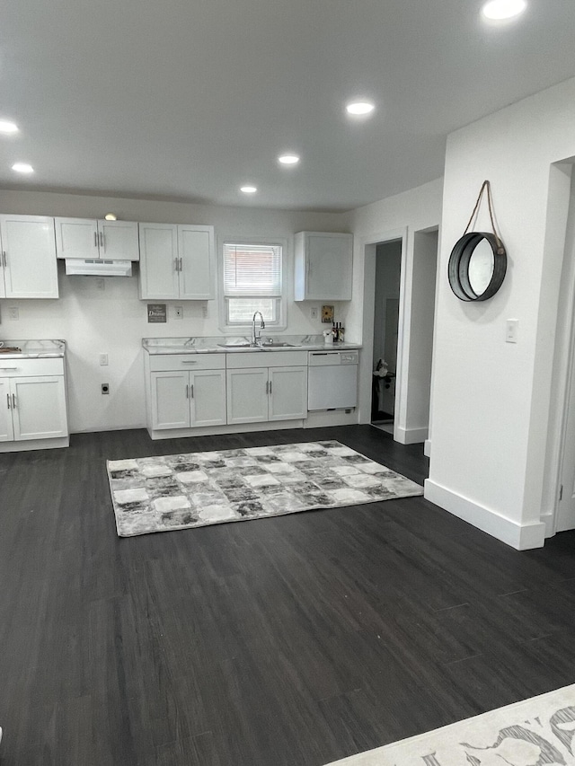 8841 Auburn St, Detroit, MI 48228 - kitchen with white dishwasher, recessed lighting, a sink, dark wood-type flooring, and white cabinetry