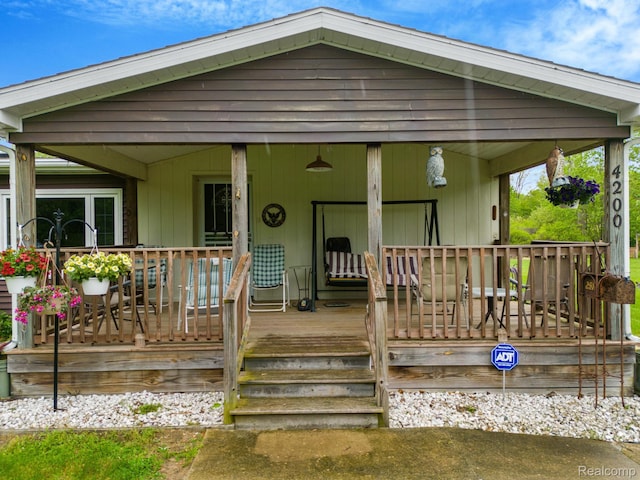 4200 Chapman Rd, Stockbridge, MI 49285 - view of front of house with covered porch