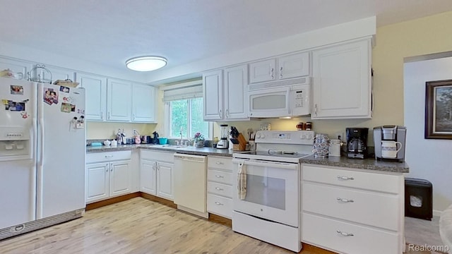 4200 Chapman Rd, Stockbridge, MI 49285 - kitchen featuring white appliances, a sink, and white cabinets