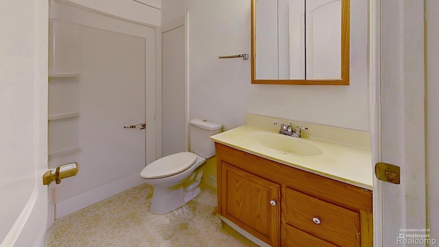 4200 Chapman Rd, Stockbridge, MI 49285 - bathroom featuring vanity and toilet