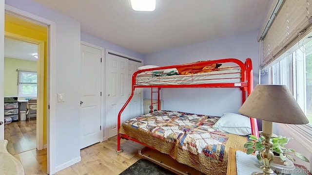 4200 Chapman Rd, Stockbridge, MI 49285 - bedroom with wood finished floors