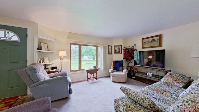 4200 Chapman Rd, Stockbridge, MI 49285 - carpeted living room featuring baseboards