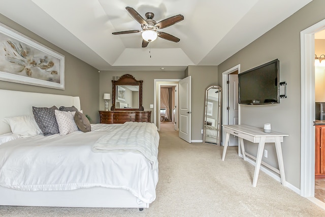 58799 Carriage Ln, South Lyon, MI 48178 - bedroom with light carpet, a tray ceiling, baseboards, vaulted ceiling, and a ceiling fan