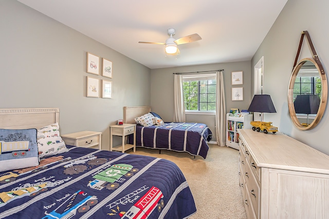 58799 Carriage Ln, South Lyon, MI 48178 - bedroom featuring light colored carpet and a ceiling fan