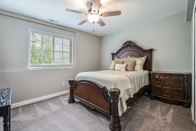 58799 Carriage Ln, South Lyon, MI 48178 - carpeted bedroom with baseboards and a ceiling fan