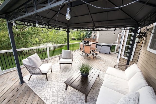 58799 Carriage Ln, South Lyon, MI 48178 - wooden deck with a gazebo, an outdoor living space, and outdoor dining space