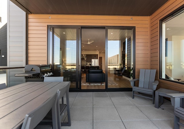 159 S River Ave Unit 303, Holland, MI 49423 - view of patio with a grill and outdoor dining area