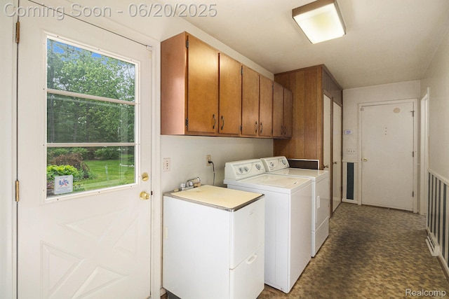 8276 Appleway Dr, Grand Blanc, MI 48439 - laundry area featuring cabinet space and washing machine and dryer