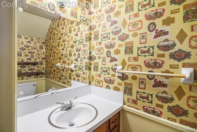 8276 Appleway Dr, Grand Blanc, MI 48439 - bathroom with wallpapered walls and vanity
