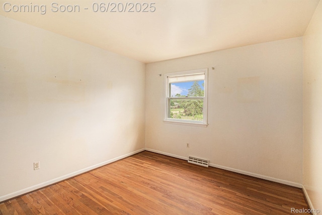 8276 Appleway Dr, Grand Blanc, MI 48439 - spare room with wood finished floors