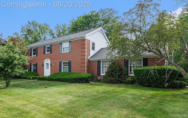 8276 Appleway Dr, Grand Blanc, MI 48439 - view of front of house with brick siding and a front lawn