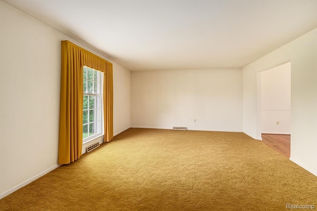 8276 Appleway Dr, Grand Blanc, MI 48439 - carpeted empty room featuring baseboards
