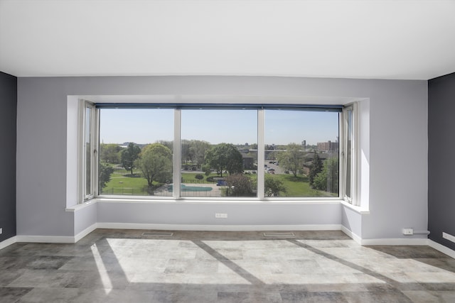 1300 E Lafayette St Unit 305, Detroit, MI 48207 - unfurnished room with plenty of natural light and baseboards