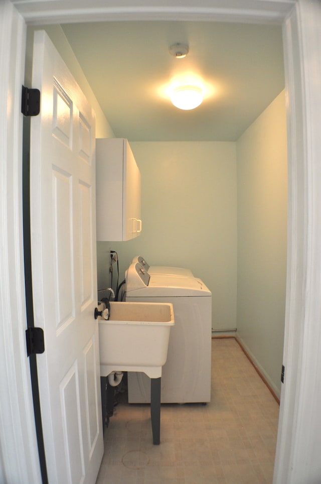 4439 Hunters Cir W, Canton, MI 48188 - laundry area with cabinet space, light flooring, and washer and dryer