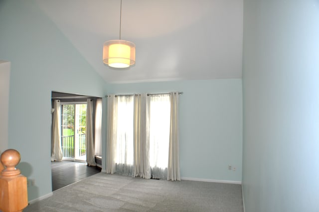 4439 Hunters Cir W, Canton, MI 48188 - empty room with carpet, baseboards, and high vaulted ceiling